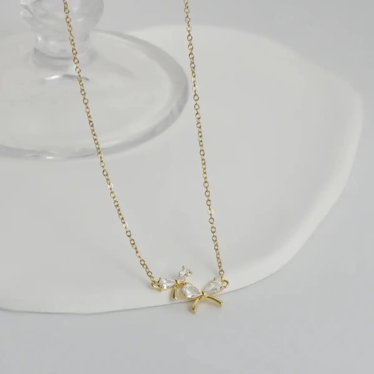 Colgante Bow Zircon